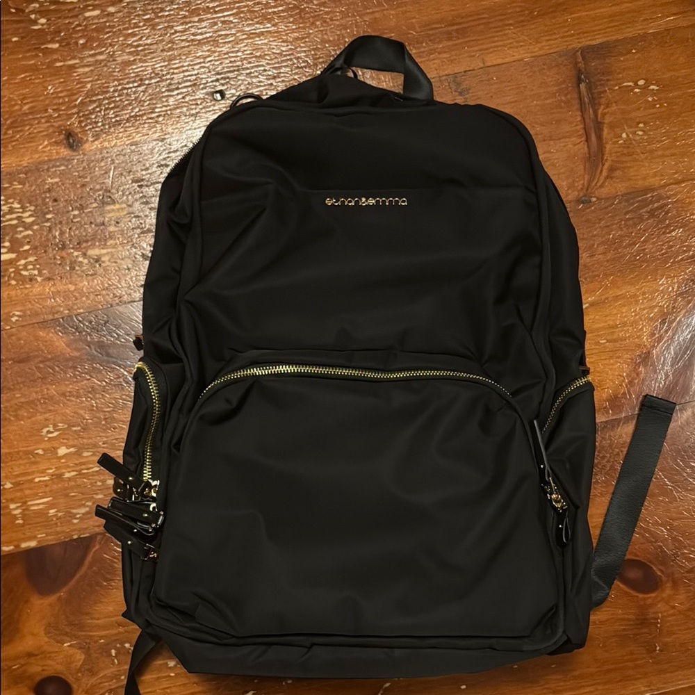 Black Backpack with Gold Accents